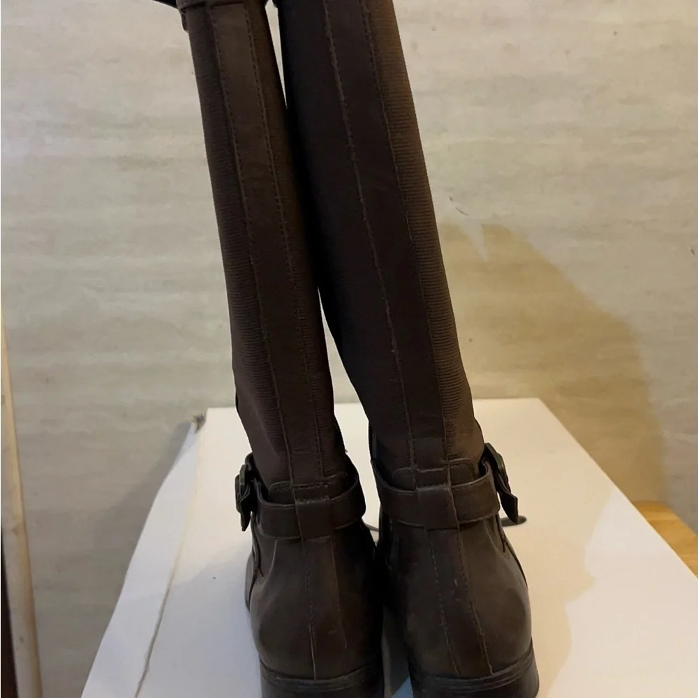 Isaac Mizrahi Live brown leather knee-high riding boots.